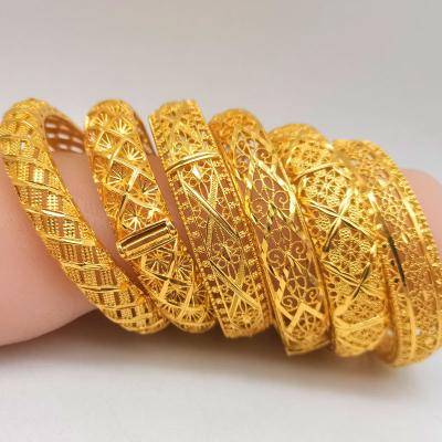 China 2022 Environmental Friendly Vintage Hollow Out Luxury Designer Jewelry 24K Gold Plated Metal Mens Wrap Bracelets Bangles For Female Women for sale