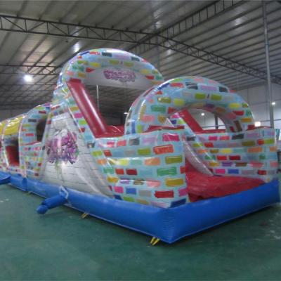 China Waterproof Colorful Inflatable Obstacle Course For Kids Inflatable Candy Artwork Obstacle for sale