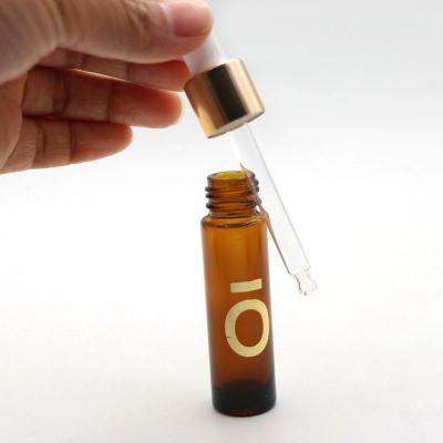 China Eco-friendly Recyclable Essential Oil Serum Bottle 10ml Empty Glass Bottles Cosmetic Amber Hair Oil Dropper Bottle for sale