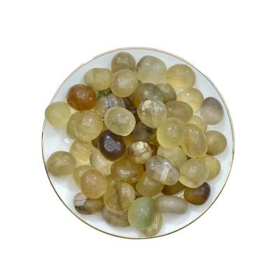 China Wholesale Polished Crystals Healing From Europe Tumbled Stones Yellow Fluorite for sale