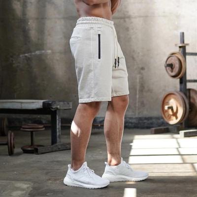 China 2022 Summer Anti-wrinkle Dr. Muscle Sports Shorts Trend Casual Fashion Men's Cotton Fitness Pants Outdoor Five Pants for sale