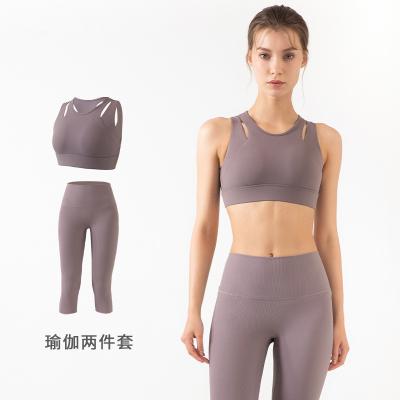 China Custom Logo Breathable Cross Back Yoga Suit Spandex Ribbed Fitness Yoga One Piece Set for sale