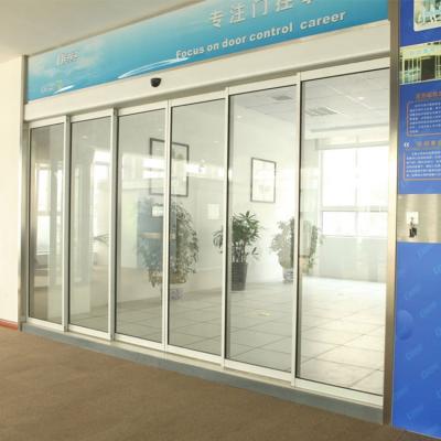 China Interior Framed Automatic Telescopic Hotel Glass Door Sliding Door Mechanism for sale