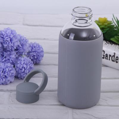 China WITH LID Water Bottle Borosilicate Glass Durable Water Bottle Eco-friendly Silicone Glass Sleeve Lid for sale