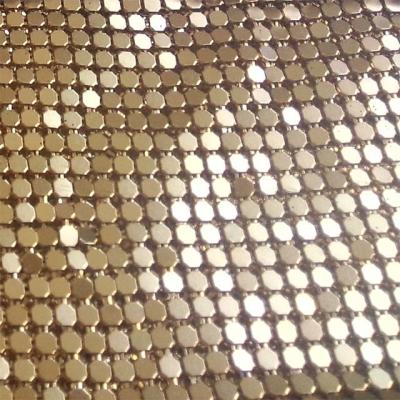 China Top quality hot sale cheap Gold Color Metallic Sequin Cloth metal Mesh curtain Fabric for clothing for sale