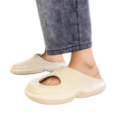 China Outdoor Shedding Super Warm Male Feeling Slippers Lovers Fashion Trend Coconut Clog Hole Sandals Cool For Women for sale