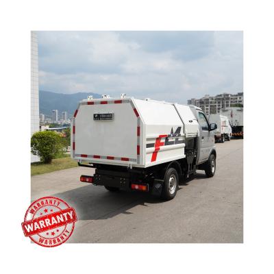 China Construction Material Stores FULONGMA 3000kg Small Capacity Garbage Compactor Truck for sale