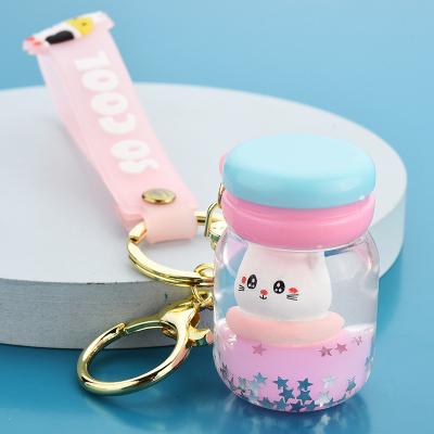 China Advertising Gift Wholesale Price Quicksand Key Chain Cute Cat Oil Filled Keyring Floating Key Chain for sale