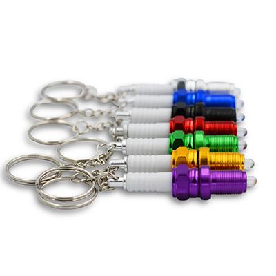 China 3D Min Colorful Auto Car Parts Key Chain Spark Plug Style Light Hot Selling Key Chain With LED Light for sale