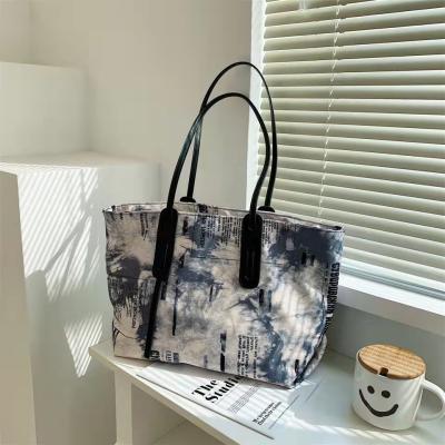 China Ladies Handbag Fashion Niche Design Large Travel Tote Bags Printed Tote Bags All Match Women for sale