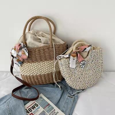 China New Woven Summer Straw Casual Handbags Cross - Body Bag Women Drawstring Handbag for sale