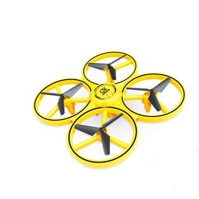 China Yellow RC model hand control gesture induction rc drone mini remove control drone for kids for sale