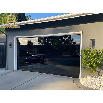 China Full View Frameless Coated Glass Aluminum Garage Door Windproof for sale