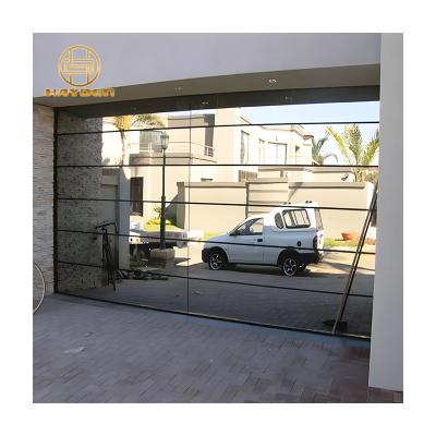 China Modern Atomic Windproof Roll Up Garage Door Glass Durable Frameless Privacy Protected Mirror Coated Tempered Glass Aluminum Garage Door for sale