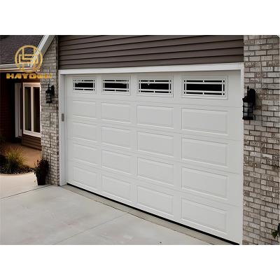 China Heat Insulation Small Squares Classic Automatic Garage Door With Perspective Windows for sale