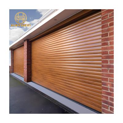 China Anti-theft Electric Woodgrain Roller Shutter Aluminum Door for sale