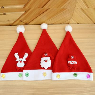 China 2020 Nonwoven Fabric Christmas Decoration Supplies Santa Christmas Hats For Adults And Kids for sale