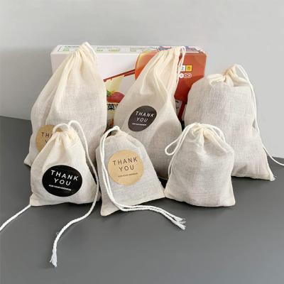 China 100% Recyclable Small Drawstring Muslin Gift Pouch Cotton Bag for sale