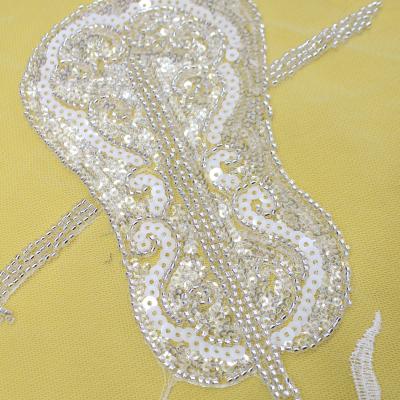 China Beautiful viable romantic embroidered lace fabric with white quality Sequain and Beads.For dress dress. Wedding dress for sale