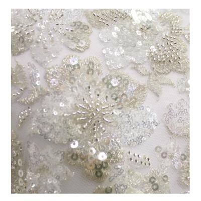 China Crystal Sequins Bridal Luxury Embroidery Viable Beads White Beaded Wedding Tulle Lace Fabric for sale