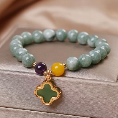 China High Quality Clover Jade Dangle Bracelets For Women Gold Color Bead Lucky Charm Bracelet for sale