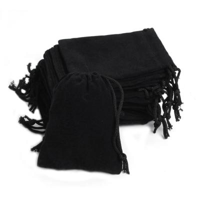 China Black Velvet Gift Jewelry Pouch 5*7cm Velvet Gift Bags And Pouches Drawstring Gift Packaging Bag for sale