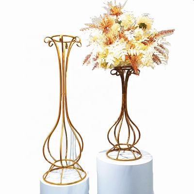 China Wedding Centerpieces / Wholesale Hollow Party Wrought Iron Prop Waist Metal Flower Stand Layout Centerpieces And Gold Table Decorations for sale