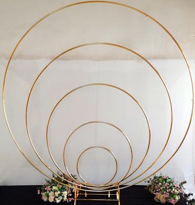 China Wedding Backdrop Decorations Hot Sale Wedding Backdrop Round Arch Gold Flower Stand Props Thicken Wrought Iron Metal Circle Stage Decor Frame for sale