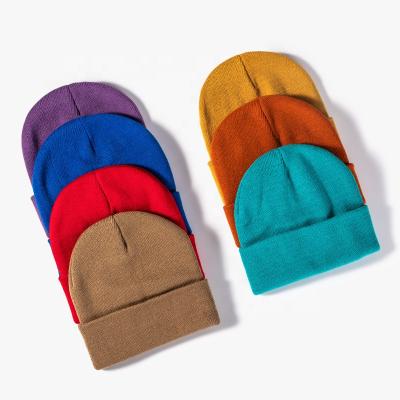 China Cheap Custom Logo Embroidery Unisex Multi Color Badge Pom Warm Knitted Beanie Hats Manufacture COMMON for sale