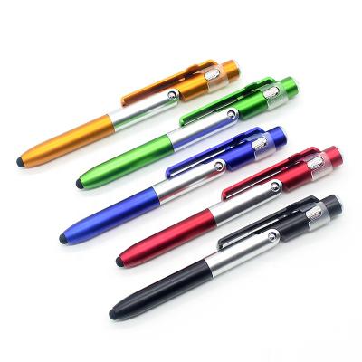 China Popular 4 in 1 Light Capacitive Touch Screen LED Ballpoint Pens for Tablet Touch Pen Stylus Pen Cell Phone Foldable Stand Holder for sale