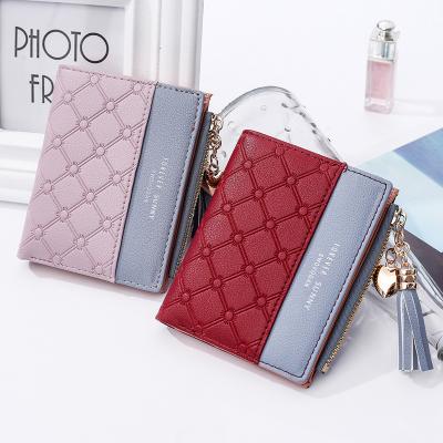 China Fashion Multifunctional Hot Selling Tassel Short Buckle Wallet Small Women's Zero Zipper Wallet for sale