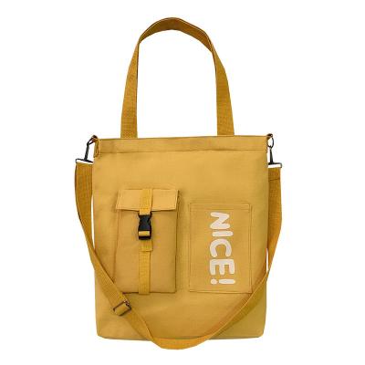 China Multifunctional Canvas Messenger Bag Handbag Student Straddle Single Shoulder Canvas Bag Shopping Handbag for sale