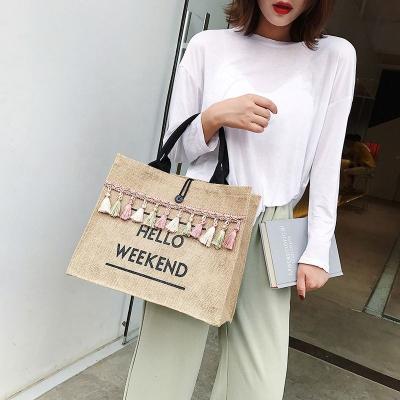 China Custom big capacity tassel fashion logo linen weave letter printing women fasion ethnic handbag packaging for sale