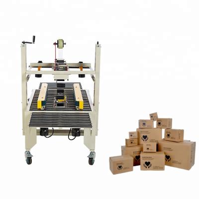 China Efficient carton box packing machine small carton strip sealing machine price for sale