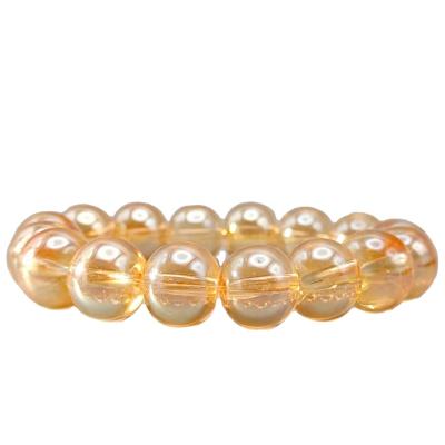 China New Champagne Glass Bead Elastic Bracelet 12mm simple unisex wholesale environmental friendly for sale