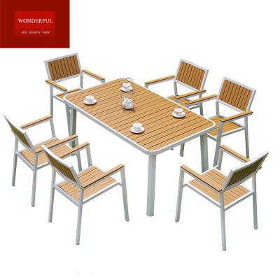 China Water Proof Elegant outdoor patio plastic wood furniture dining sets chairs  and  table  for garden for sale