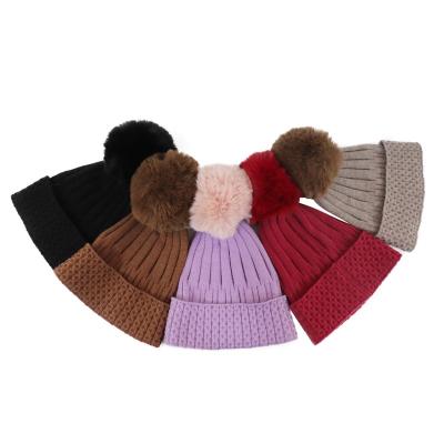 China 2022 JOINT Hot New Fashion Custom Style Winter Women Knitted Beanie Big Pom Pom Hat for sale