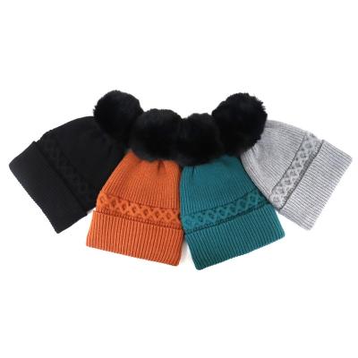 China COMMON Directly Built Newly Sold Fur Pompom Elastaned Knitted Fashionable Women Warm Beanie for sale