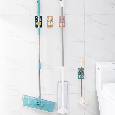 China Cartoon Viable Free Punch Hook Bathroom Broom Hanger Card Holder Broom Clip Hanging Clip for sale