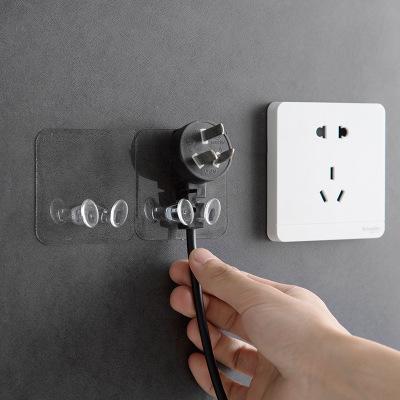 China Kitchen Viable Strong Adhesive Wall Hook Creative Wall Hook Socket Bracket Socket Holder Creative for sale