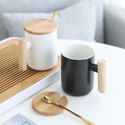 China Viable Hot Selling Nordic Matte White Black Logo Custom Ceramic Coffee Mug With Wood Handle for sale