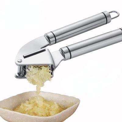 China Viable Manual Stainless Steel Garlic Presser Meat Grinder with Grinder Ginger Grinding Grater Kitchen Gadget Peeler Garlic Press for sale