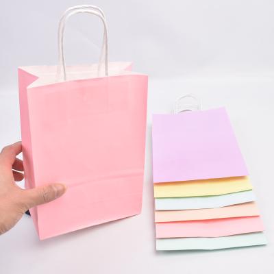 China Reused Materials Logo Twisted Handle Gift Shopping Custom Packaging Kraft Paper Craft Carry Bags White Kraft Paper Bag for sale