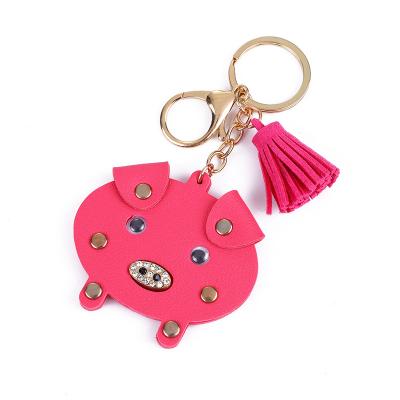 China Best Selling Creative PU Tassel Strawberry Key Chain Pig Car Leather Craft Bag Handmade Pendant Key Model for sale