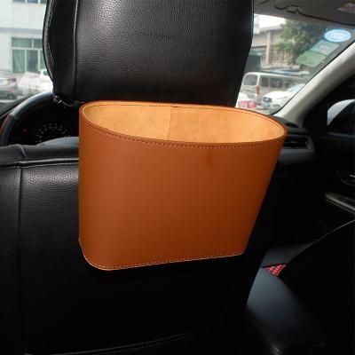 China Car Stored Back Seat Hanging Waterproof Car Waste Bag Trash Can With Lid Bin for sale