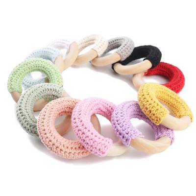 China Wooden Teether Ring Crochet Baby Teether Colorful Organic Wooden Baby Teether Rings 50MM Eco-Friendly Wooden Rattle for sale