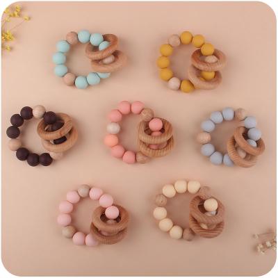 China BPA Free 7 Colors Beech Wood Baby Teether BPA Free Silicone Baby Pacifier Chain Teether Toy for sale