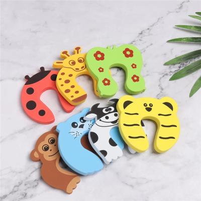 China Eco-freindly Design 7 Cute Animal Finger Kids Safe Soft Baby Safety Protection Foam Door Stopper for sale