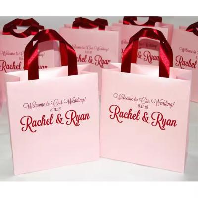 China Pink Custom Holiday Gift Bags 3D Effect Kraft Shopping Bags Custom Logo for sale