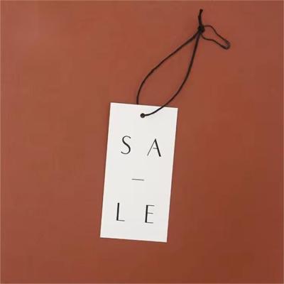 China Gifts String Custom Clothing Labels Black Paper Price Tags Hang Tags For Clothing for sale